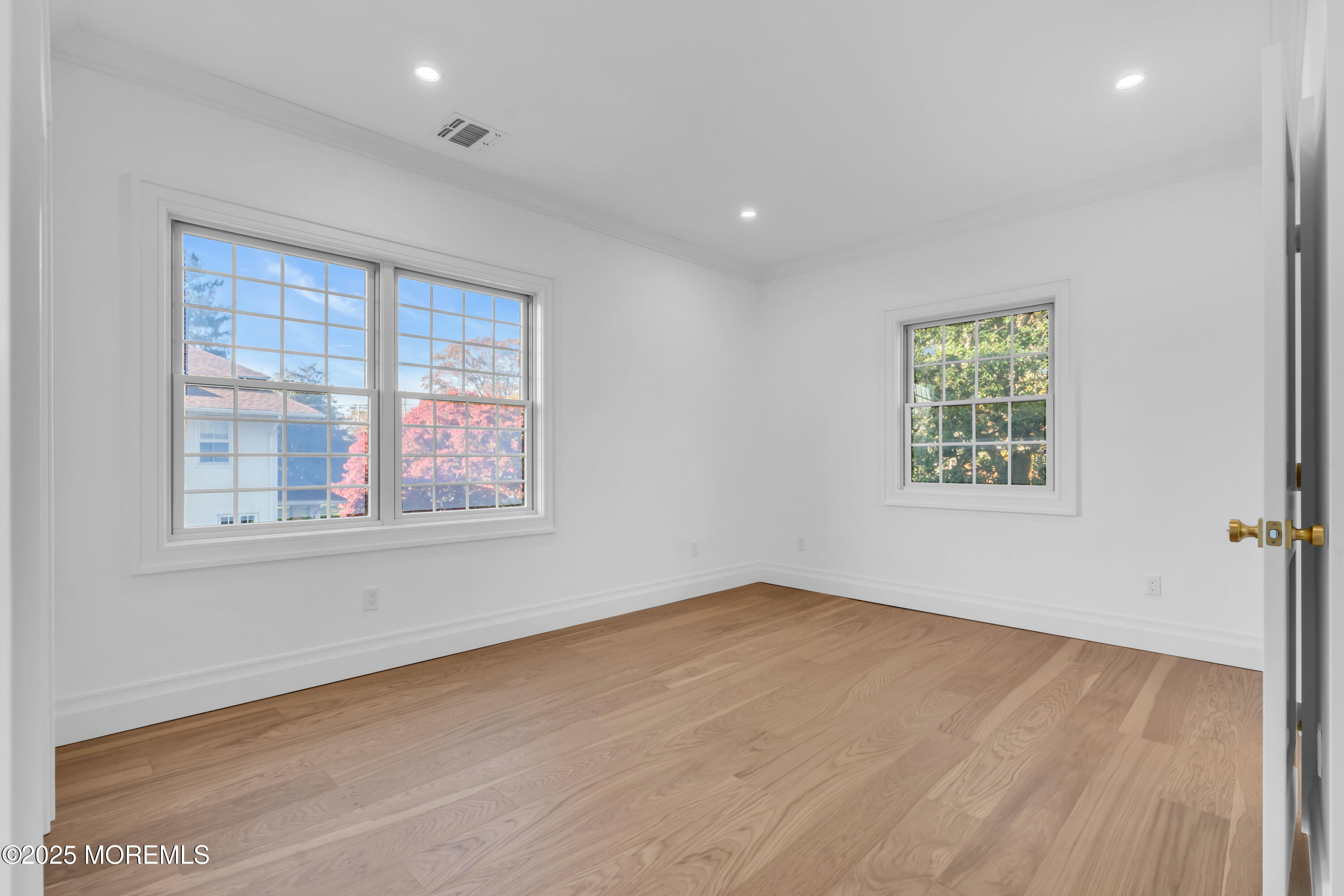 340 River Road Fair Haven, NJ 07704 - Photo 29 of 35 an empty room with wooden floor and windows