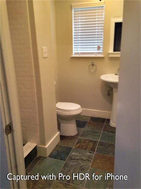 1538 Welch Street, Unit 1/2 Houston, TX 77006 - Photo 13 of 18 a bathroom with a toilet and a window