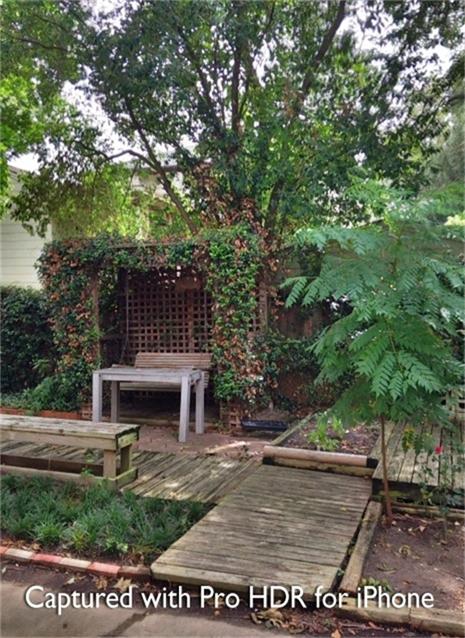 1538 Welch Street, Unit 1/2 Houston, TX 77006 - Photo 16 of 18 a view of a house with a yard