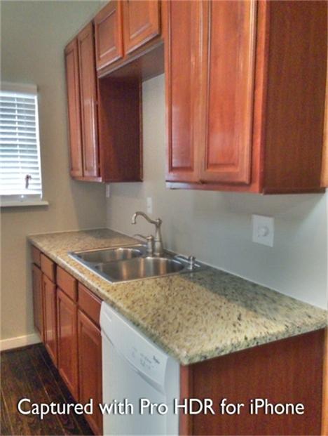 1538 Welch Street, Unit 1/2 Houston, TX 77006 - Photo 9 of 18 a kitchen with granite countertop a sink window and cabinets