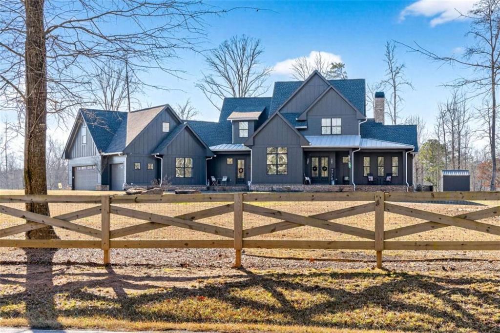 a front view of a house with swimming pool