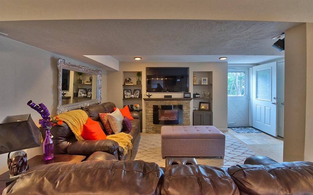 130 Prittstown Road Mount Pleasant, PA 15666 - Photo 12 of 21 The family room is a great space to host family and friends. The stone feature wall creates a great focal point for the room.