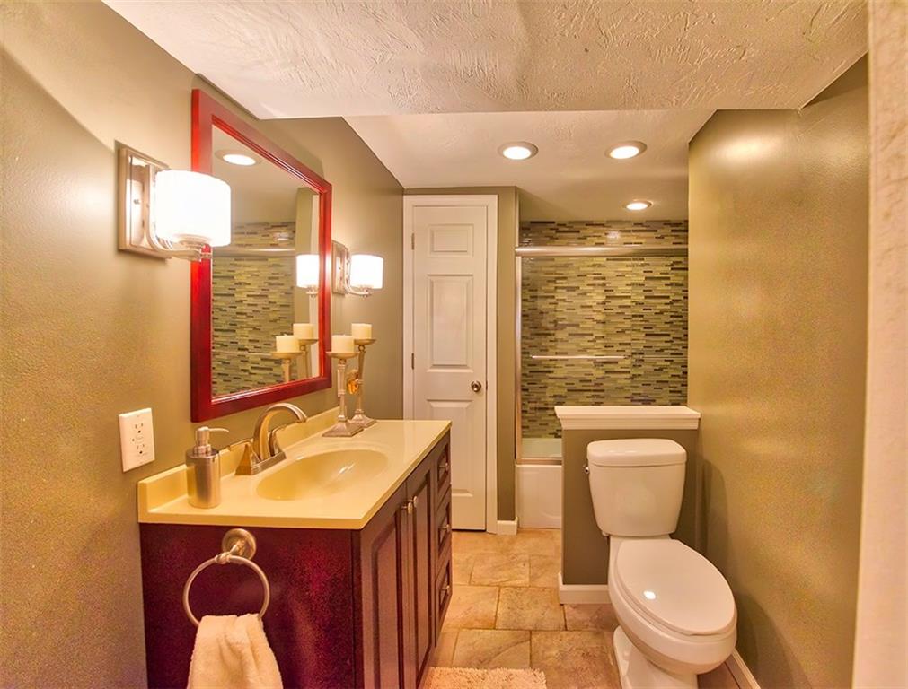 130 Prittstown Road Mount Pleasant, PA 15666 - Photo 18 of 21 Full lower level bath with beautiful glass mosaic tile.