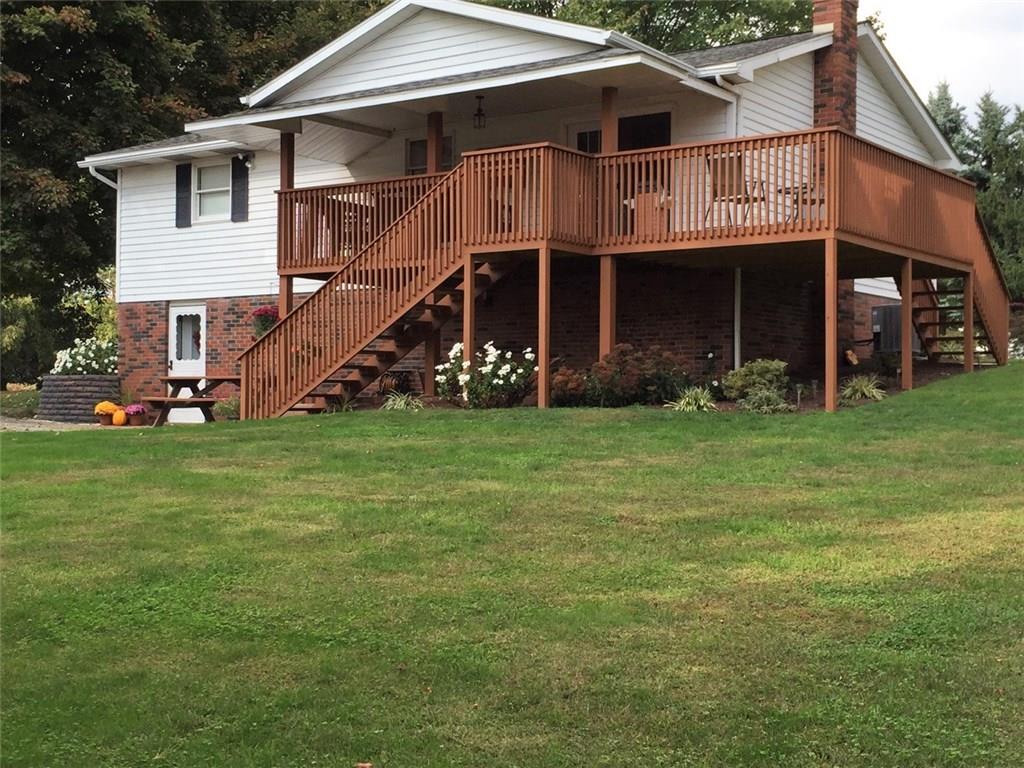 130 Prittstown Road Mount Pleasant, PA 15666 - Photo 21 of 21 The yard is large and flat very usable. The wrap around deck is a great place to take in the mountain views. It was just painted last summer.