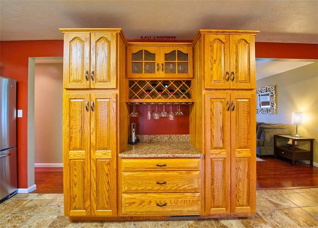 130 Prittstown Road Mount Pleasant, PA 15666 - Photo 6 of 21 Custom built wine bar is great for parties friends and family can serve themselves. For everyday use there is built in pantry storage on each side. Everything has a place in this kitchen.