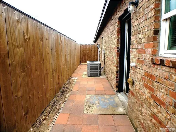 a view of a pathway with a building in the background