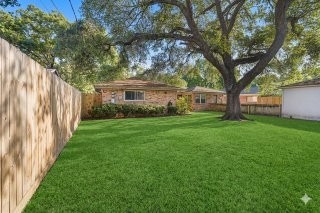 6002 McKnight Street Houston, TX 77035 - Photo 15 of 28 a view of house with backyard