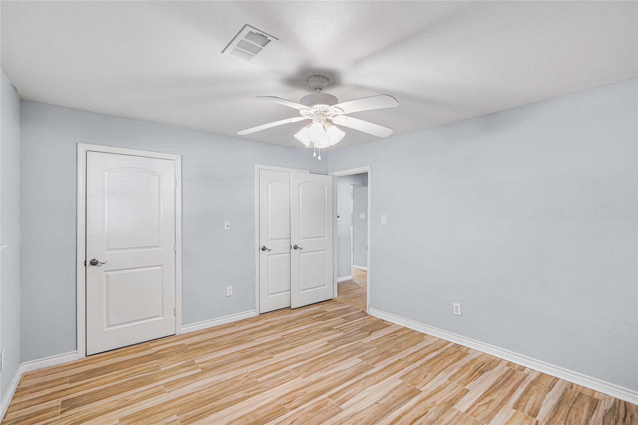 6002 McKnight Street Houston, TX 77035 - Photo 17 of 28 a view of a room with a ceiling fan