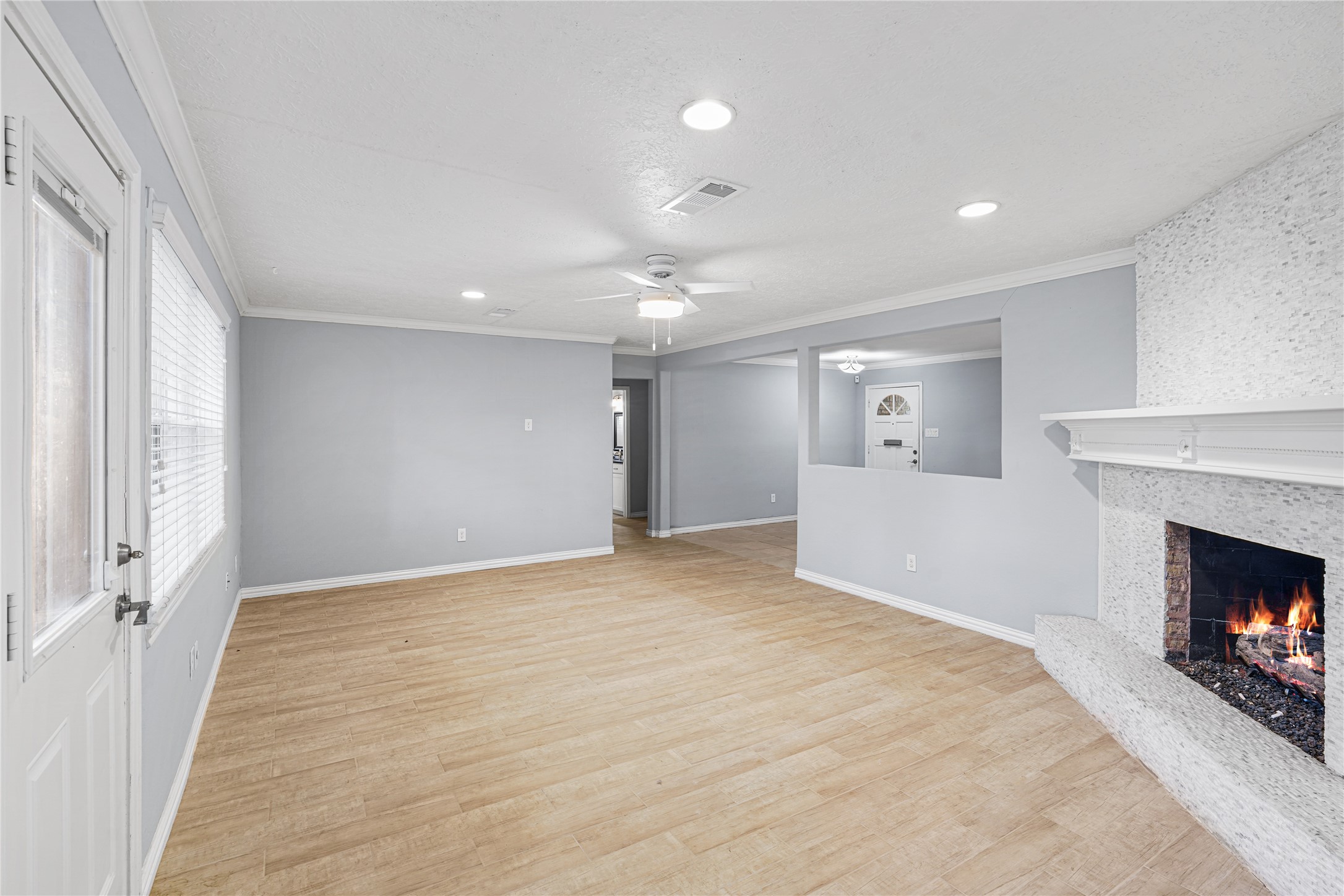 6002 McKnight Street Houston, TX 77035 - Photo 5 of 28 a view of an empty room and fire place