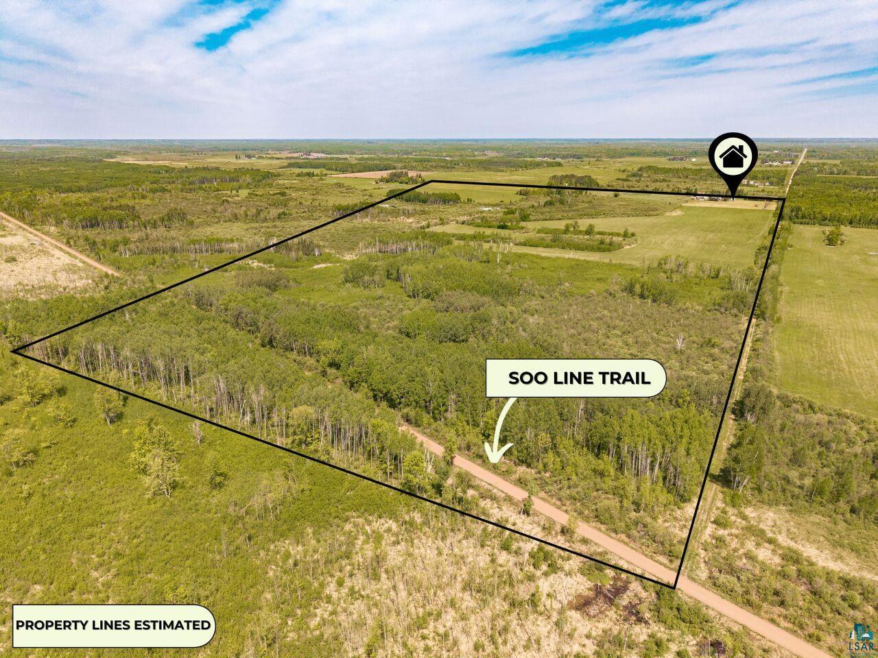 6606 Metso Road Kettle River, MN 55757 - Photo 2 of 84 Expansive land parcel featuring diverse topography, including wooded areas and open fields