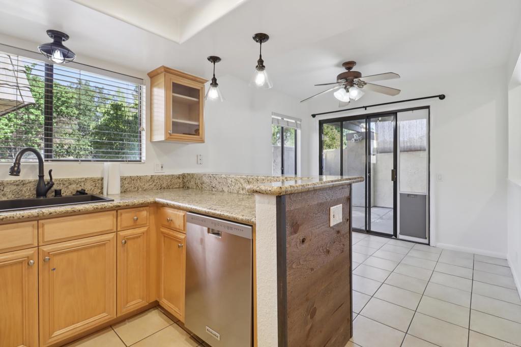 2140 Alpine Glen Place Alpine, CA 91901 - Photo 12 of 34 a kitchen with cabinets and window