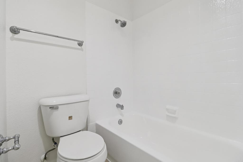 2140 Alpine Glen Place Alpine, CA 91901 - Photo 22 of 34 a white toilet sitting next to a bath tub