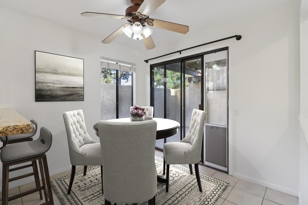 2140 Alpine Glen Place Alpine, CA 91901 - Photo 3 of 34 a dining room with furniture a chandelier and wooden floor