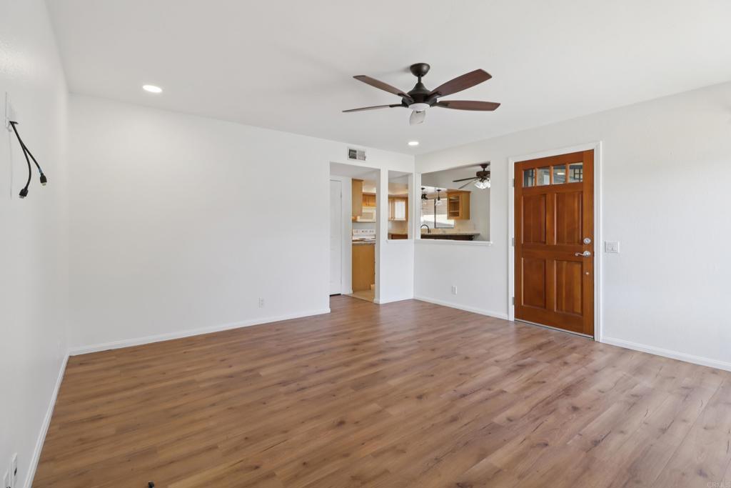 2140 Alpine Glen Place Alpine, CA 91901 - Photo 8 of 34 a view of empty room with wooden floor and window