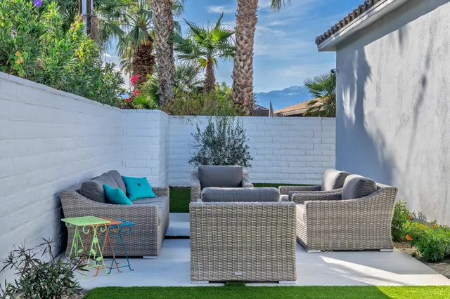 a view of a terrace with chairs