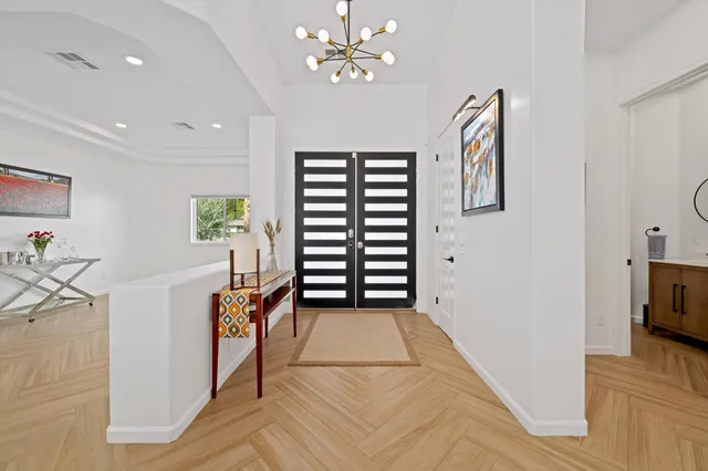 a view of a house with backyard and garden