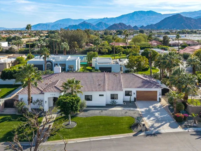 a bedroom with a bed and a fireplace
