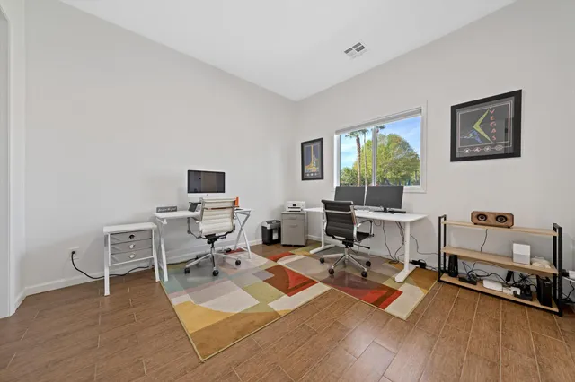 a outdoor living space with patio furniture and a potted plant