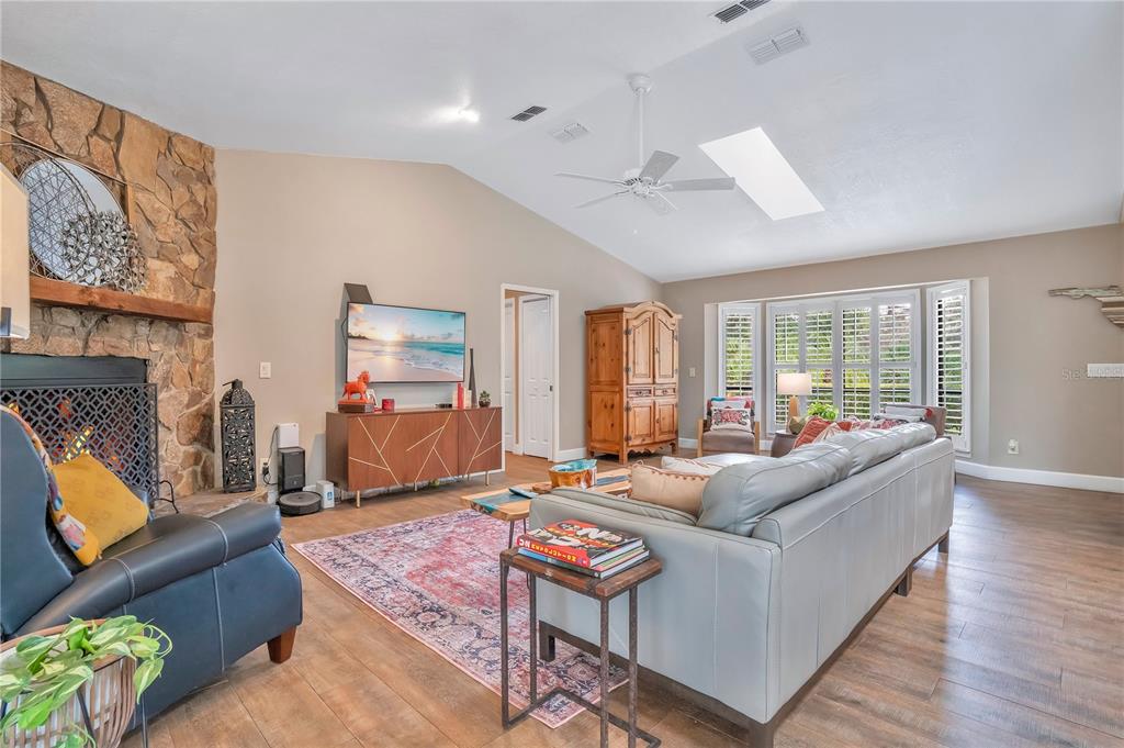 9488 Shortleaf Court Apopka, FL 32703 - Photo 16 of 60 a living room with furniture and a flat screen tv