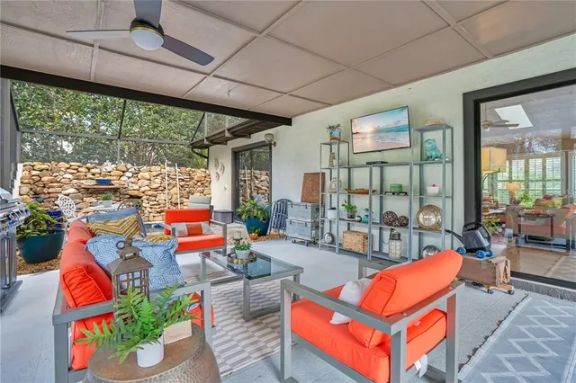 a view of a dining space with a table and chairs