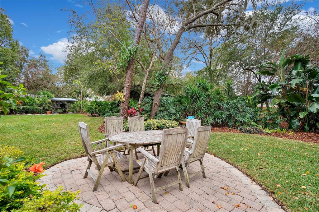 9488 Shortleaf Court Apopka, FL 32703 - Photo 55 of 60 a view of a dining space with a table and chairs