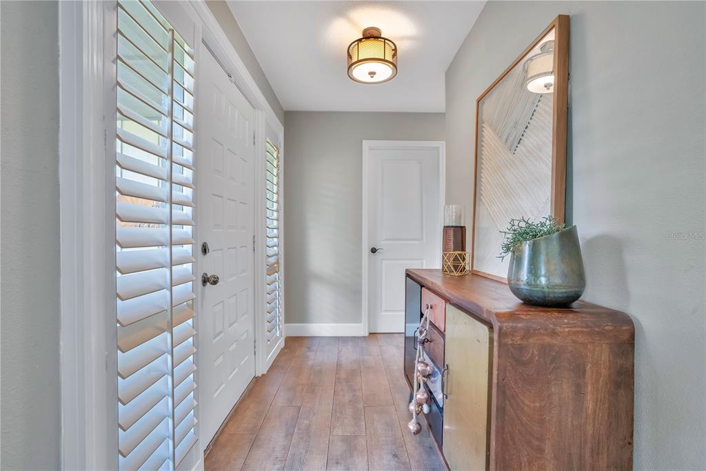 9488 Shortleaf Court Apopka, FL 32703 - Photo 9 of 60 a view of hallway with wooden floor