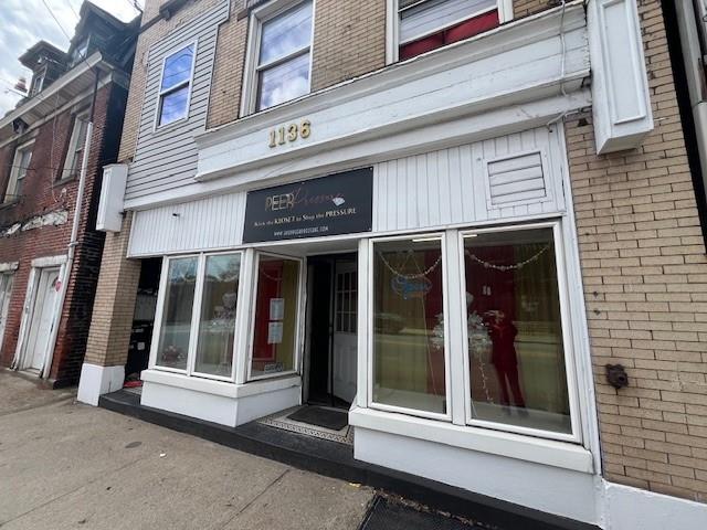 1136 Brownsville Road Pittsburgh, PA 15210 - Photo 2 of 28 front view of an building