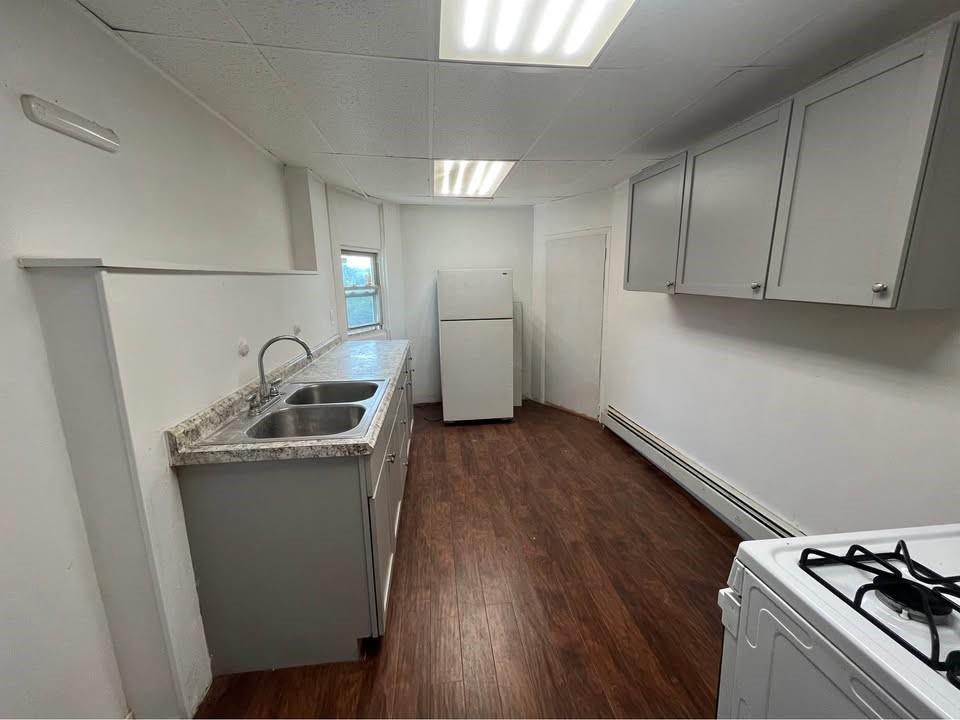1136 Brownsville Road Pittsburgh, PA 15210 - Photo 25 of 28 a view of a storage and utility room with a sink
