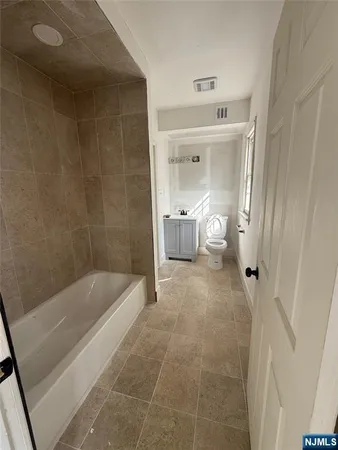 a bathroom with a bathtub