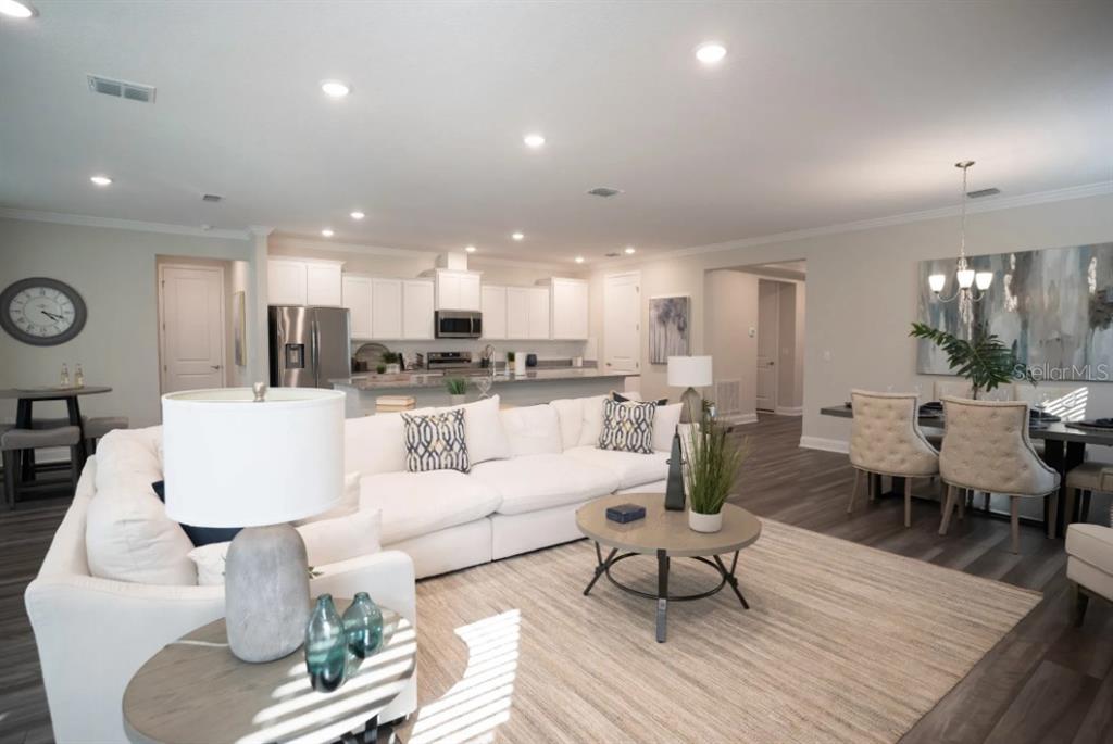 74 Greentree Street Homosassa, FL 34446 - Photo 8 of 21 a living room with furniture and kitchen view