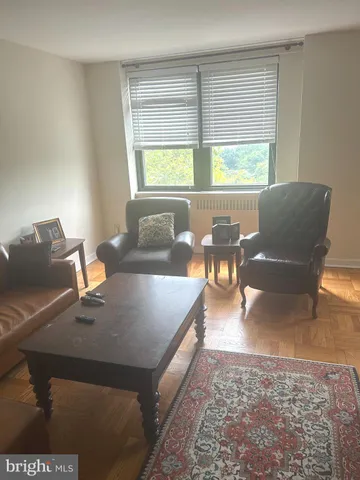 a living room with furniture and window