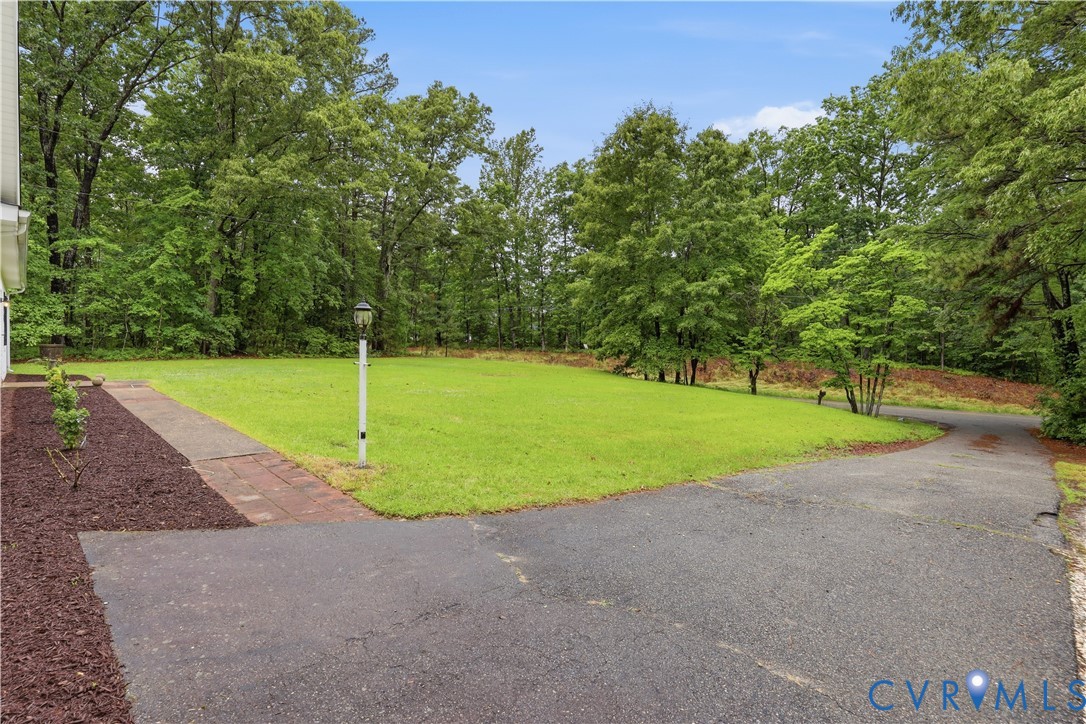 10152 Georgetown Road Mechanicsville, VA 23116 - Photo 32 of 35 a view of a golf course with a park