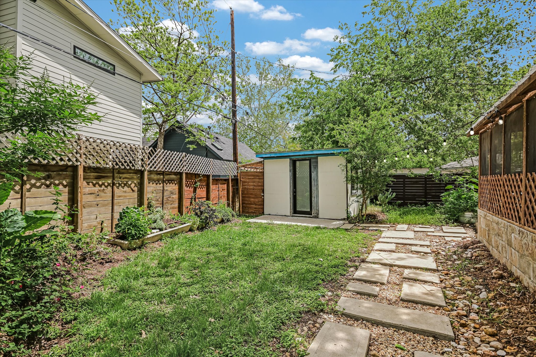 504 Powell Circle Austin, TX 78704 - Photo 20 of 23 a front view of a house with garden