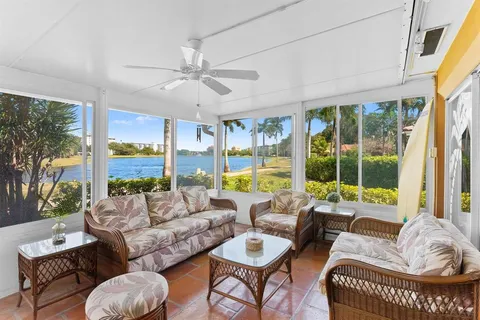 a bedroom with a bed and a television