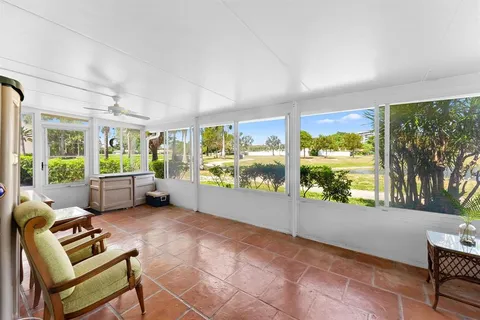 a bathroom with a shower and a sink