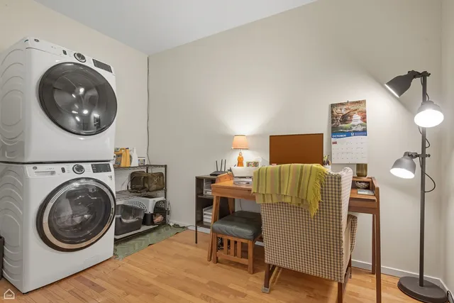 a view of livingroom with washer and dryer