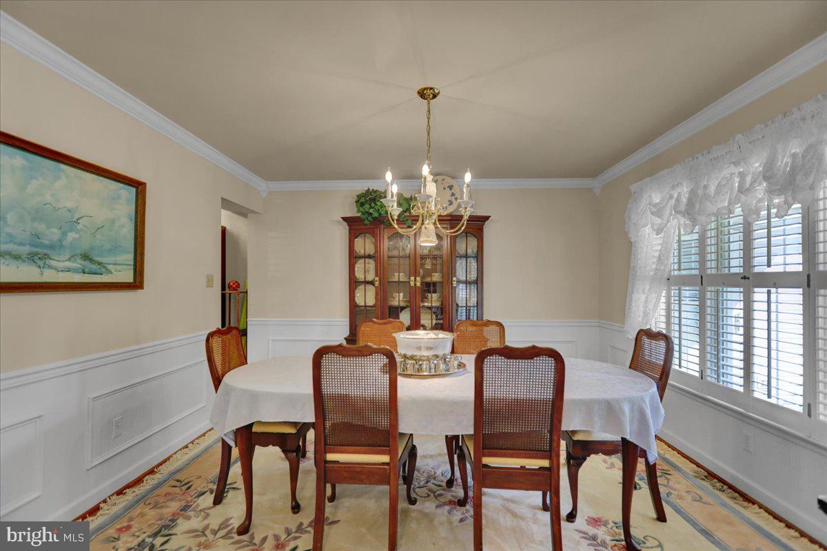 124 Pennsylvania Avenue Sinking Spring, PA 19608 - Photo 9 of 59 Formal DR w/ HW floors, chair rail and crown mold