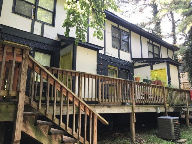 1228 Gorman Street Raleigh, NC 27606 - Photo 4 of 10 a view of a house with a wooden deck
