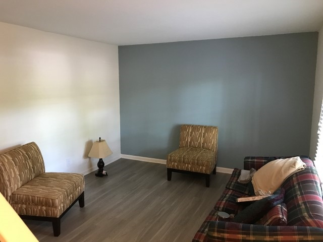 1228 Gorman Street Raleigh, NC 27606 - Photo 6 of 10 a living room with furniture and a couch