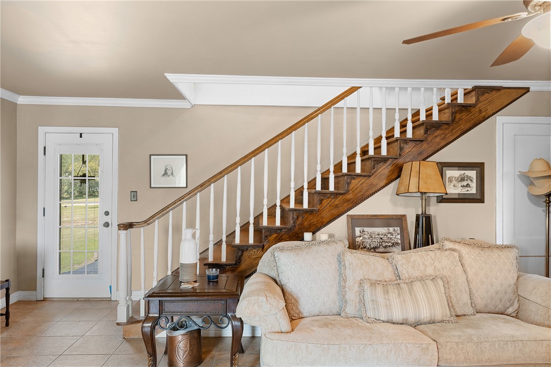 10415 McKnight Road Brenham, TX 77833 - Photo 14 of 23 a view of entryway and hall with wooden floor