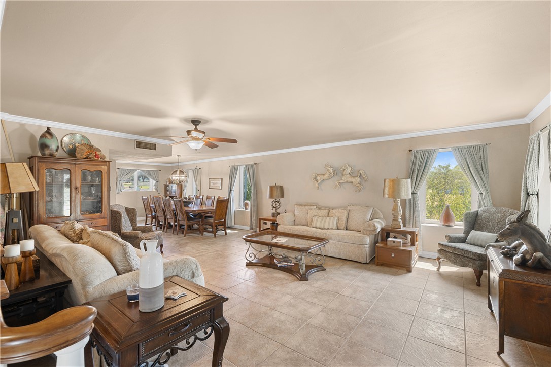 10415 McKnight Road Brenham, TX 77833 - Photo 16 of 23 a living room with furniture and a large window