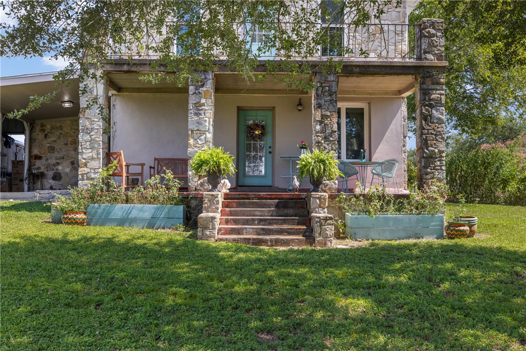 10415 McKnight Road Brenham, TX 77833 - Photo 2 of 23 front view of a house with a yard