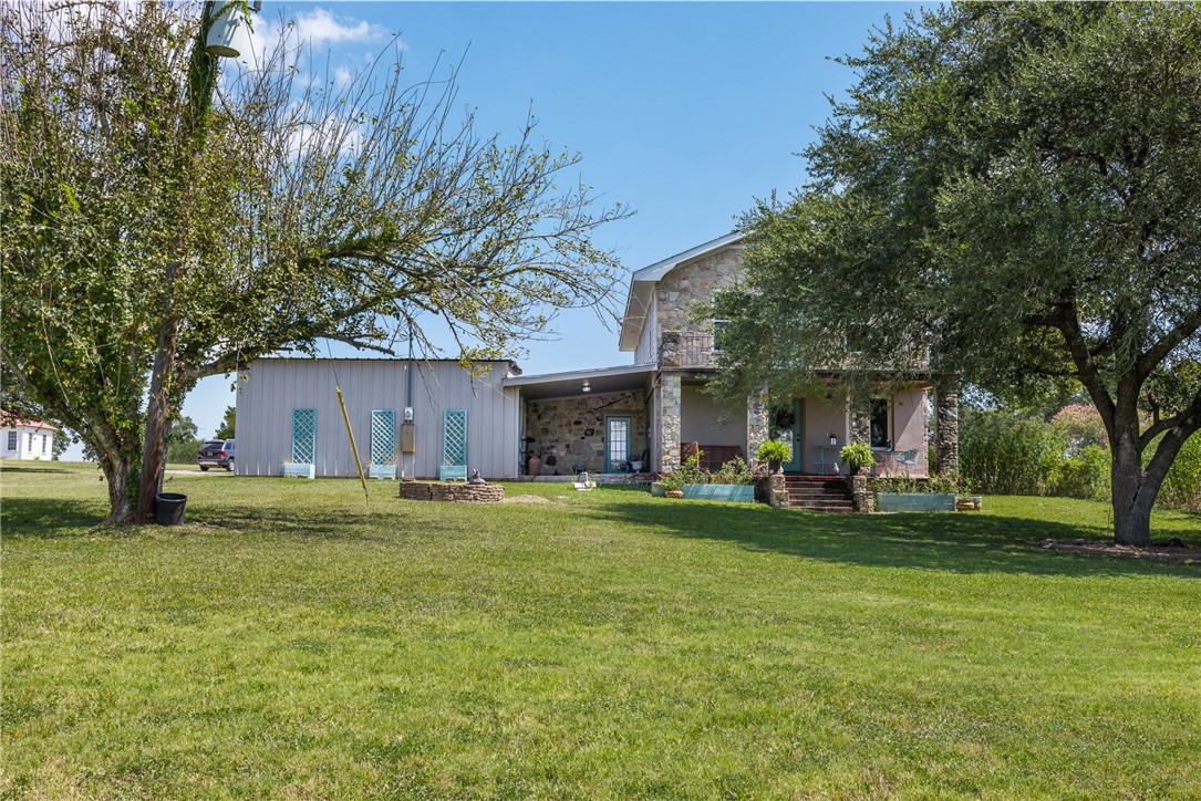 10415 McKnight Road Brenham, TX 77833 - Photo 5 of 23 a view of a house with a yard