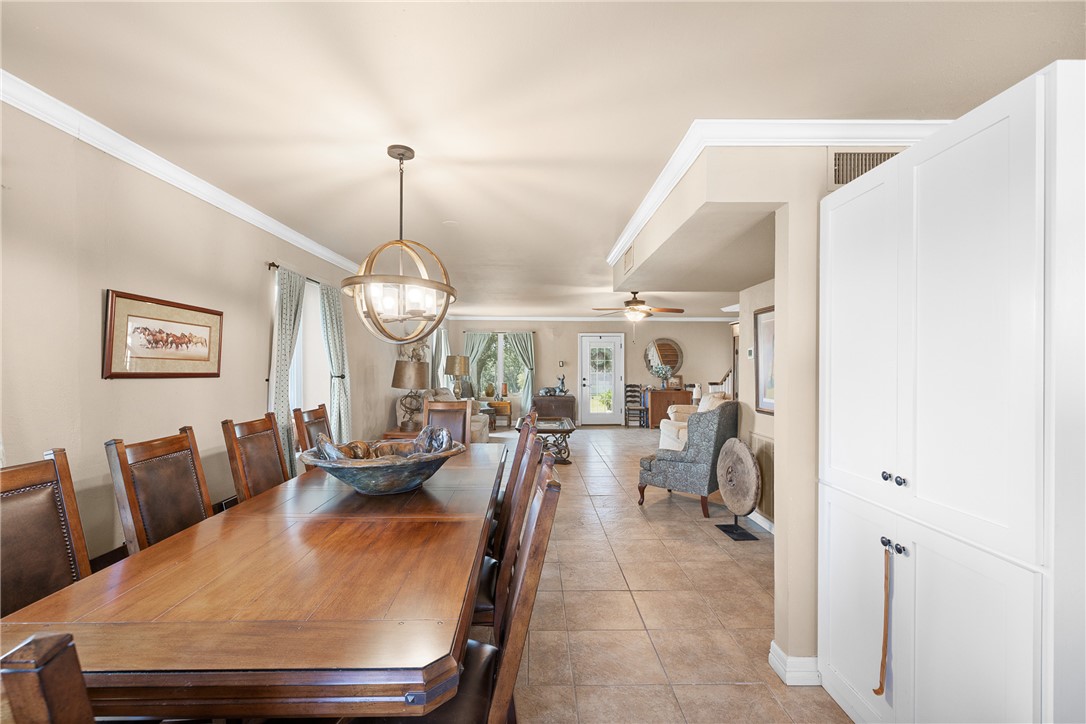 10415 McKnight Road Brenham, TX 77833 - Photo 8 of 23 a view of a dining room with furniture