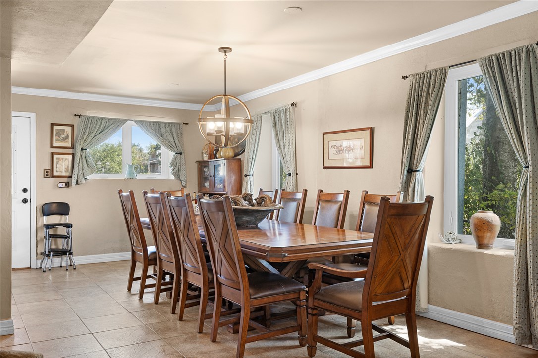 10415 McKnight Road Brenham, TX 77833 - Photo 9 of 23 a view of a dining room with furniture window and outside view