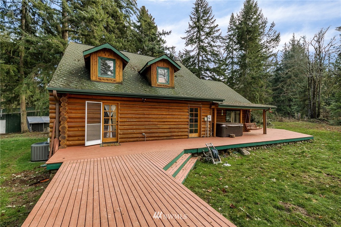 27253 Webster Road East Graham, WA 98338 - Photo 29 of 32 a front view of a house with a yard