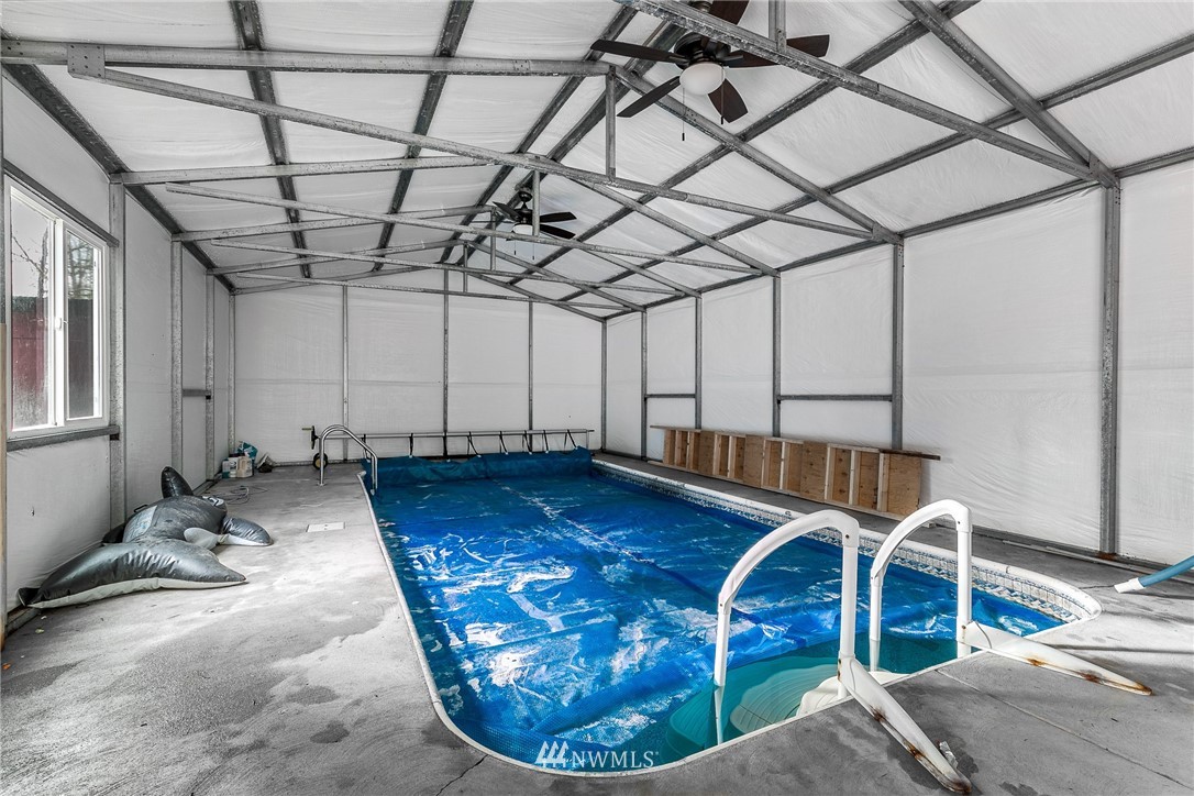 27253 Webster Road East Graham, WA 98338 - Photo 30 of 32 a view of a indoor swimming pool