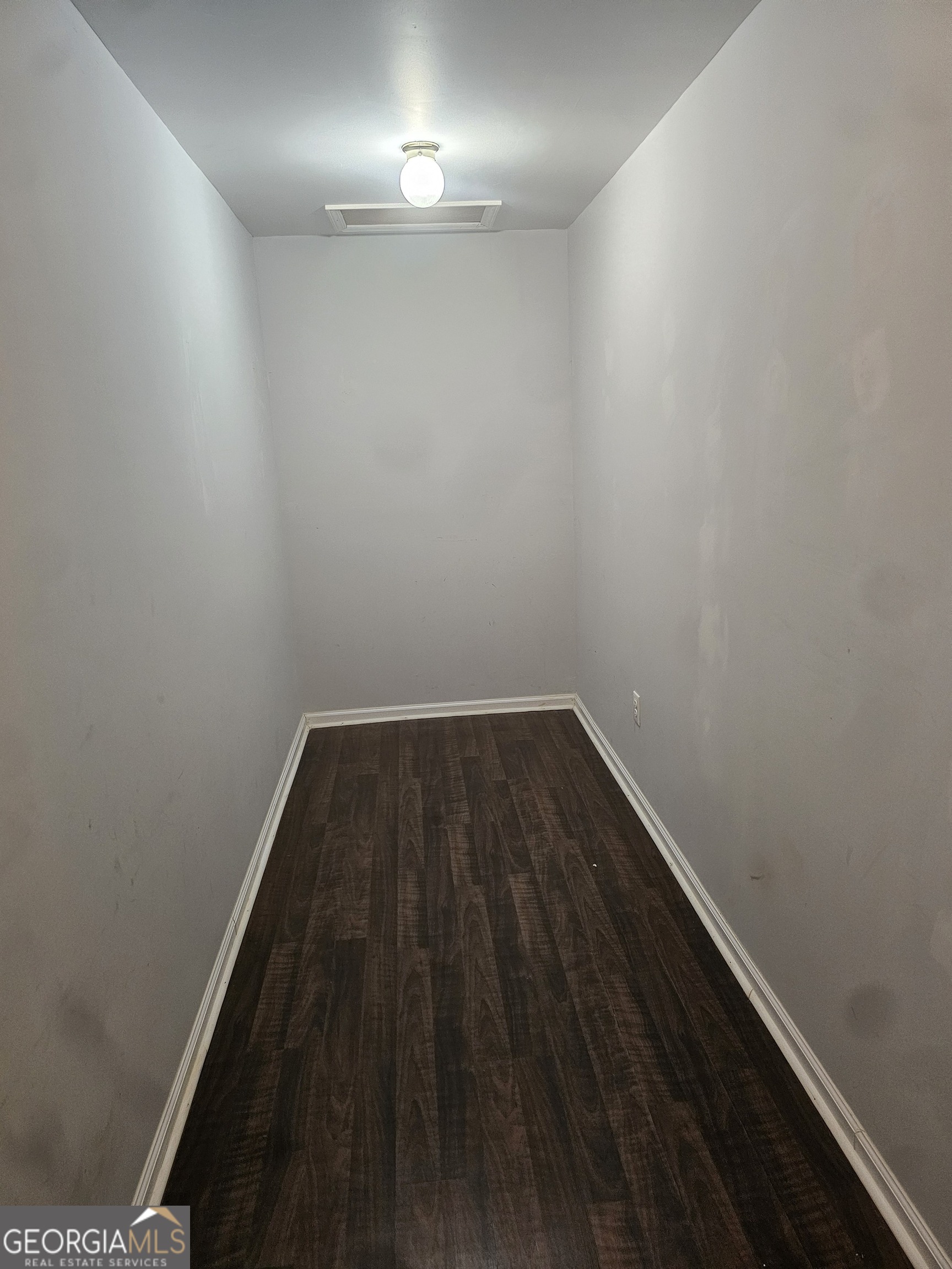 695 Frost Road Bowdon, GA 30108 - Photo 11 of 32 a view of wooden floor in a small room