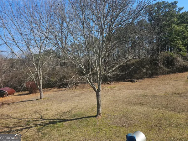 a view of yard covered with snow
