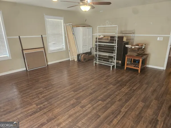 a view of livingroom with furniture and wooden floor